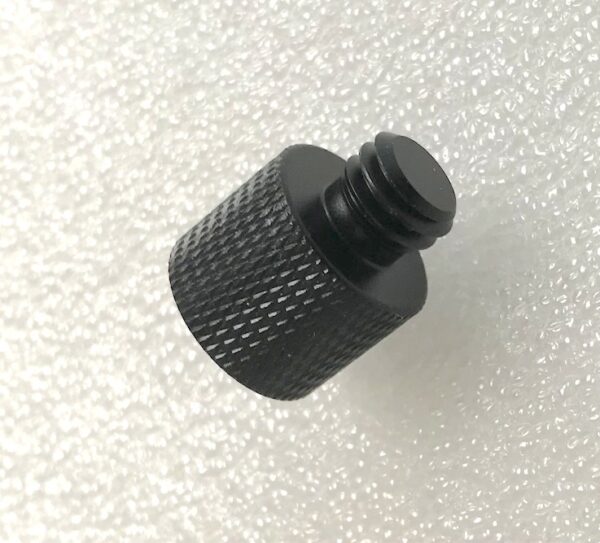 1/4" female to 3/8" male thread adapter. Black aluminium