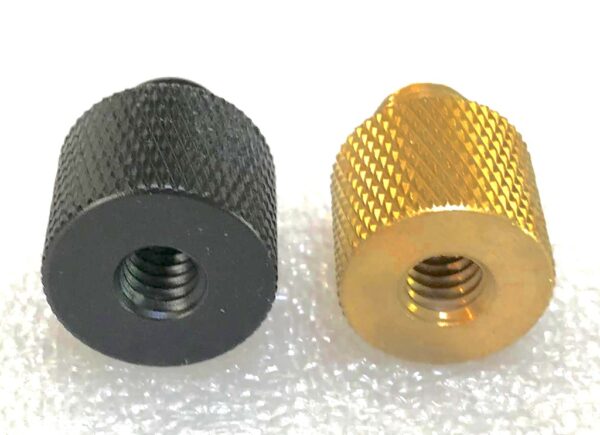 1/4" female to 3/8" male thread adapter (Left: Black Aluminium. Right: Brass)