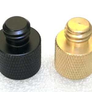 1/4" female to 3/8" male thread adapter (Left: Black Aluminium. Right: Brass)